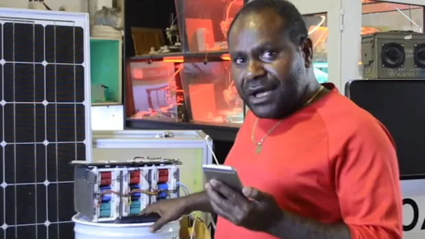 Akouboo A. Douw demonstrating energy and hardware technology